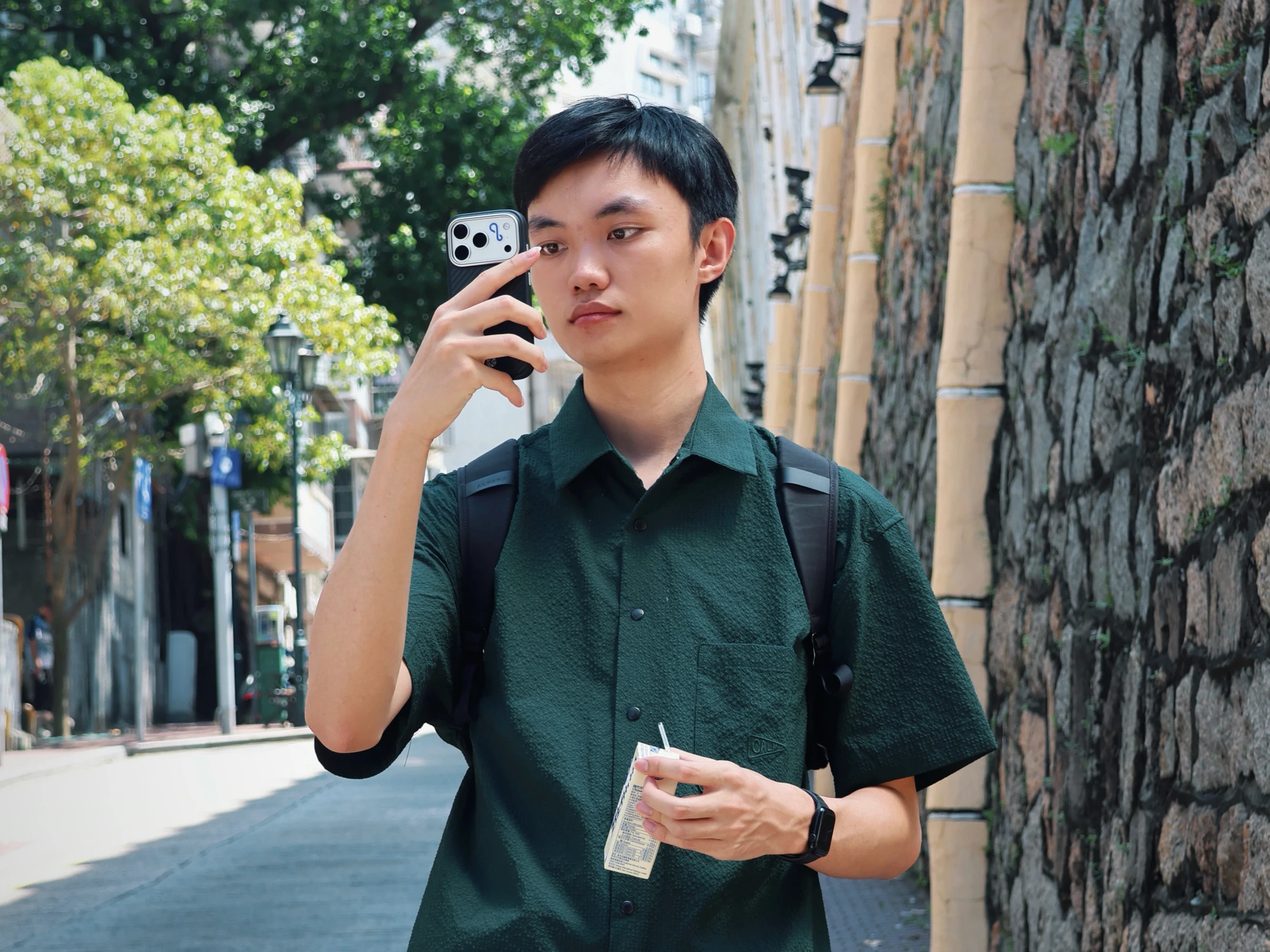 A photo of me holding my phone.